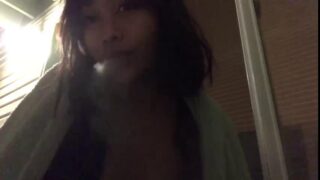 Little Asian Smoking 3 Cigarettes at once