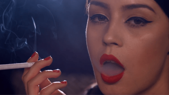 Anna smoking all white 120s in a silky robe