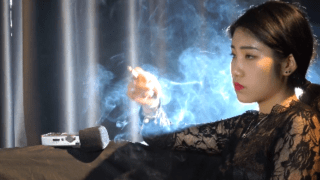 Chinese Girl Smokes Cigarettes All day