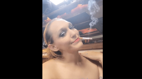 Brunette milf Smokes while riding a dick