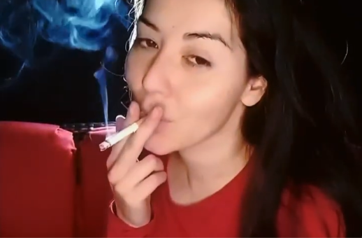 Cute brunette keeping some Smoke in her Lungs