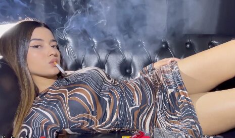 Dangling a Marlboro Red – Angie