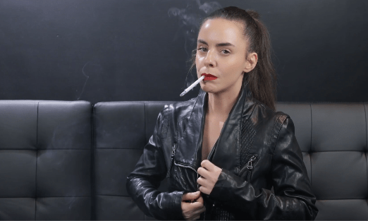 Dani Lynn Smoking in Leather Jacket