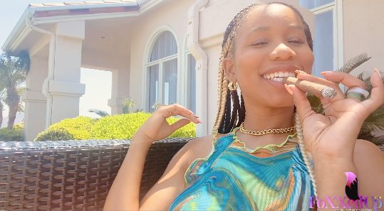 Ebony Smokes Cigar and Playing with her wet black Pussy