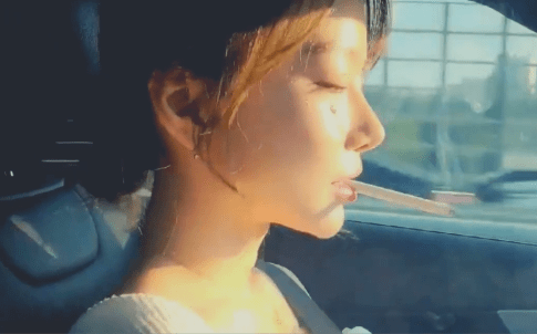 Korean girl smoking while driving