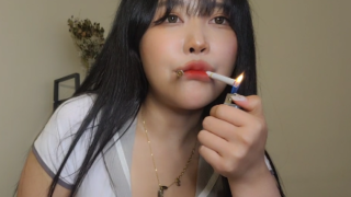 Korean Girl love to smoke Two At Once