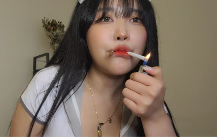 Korean Girl love to smoke Two At Once