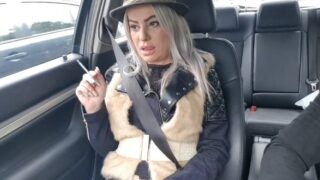 Milf smokes in the taxi then fucks the driver outdoors