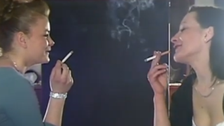 Mom and her daughter smoking while having fun