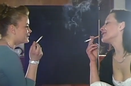 Mom and her daughter smoking while having fun