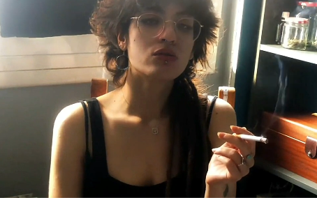 Smoking the first Cigarette in the morning with a cup of coffee