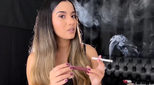 Smoking while applying my new favorite red lipstick – Angie