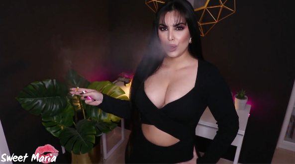 Sweet Maria Smoking in a black dress