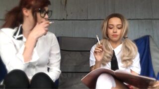 Teacher encouraging Student to Smoke Cigarettes