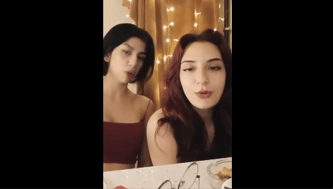 Two Beautiful Turkish girl smoking cigarette