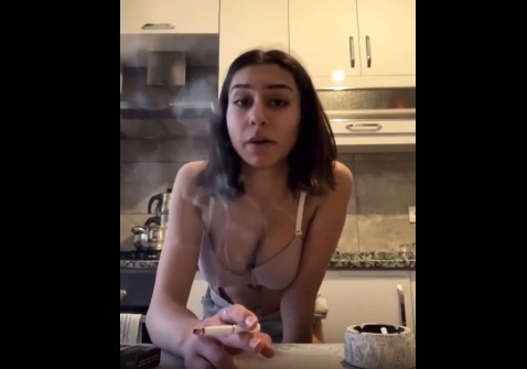 Two Teen Sisters smoking in the kitchen and twerking