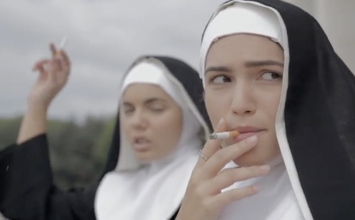 Two nun smoking cigarettes