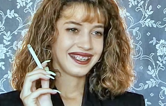 Wavy hair girl smoking girl with braces