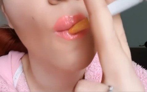 Woman smoking close up