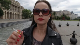 Abbie Walking and Smoking in the street of Budapest