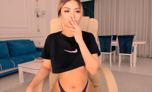 Sexy Asian Babe Smoking wearing a thong on webcam
