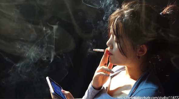 Chinese Girl Chainsmoking