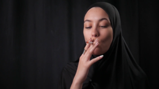 Arabic Hijab Girl Smoking Cork Cigarettes