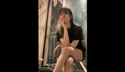 Petite Asian Having a Smoke break in the bathroom